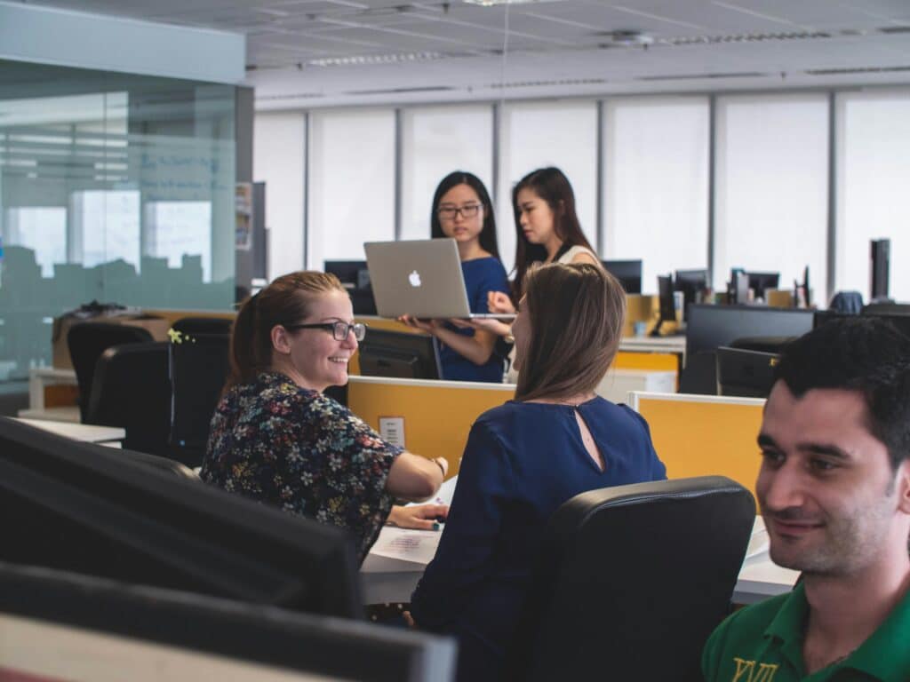 People in office chatting