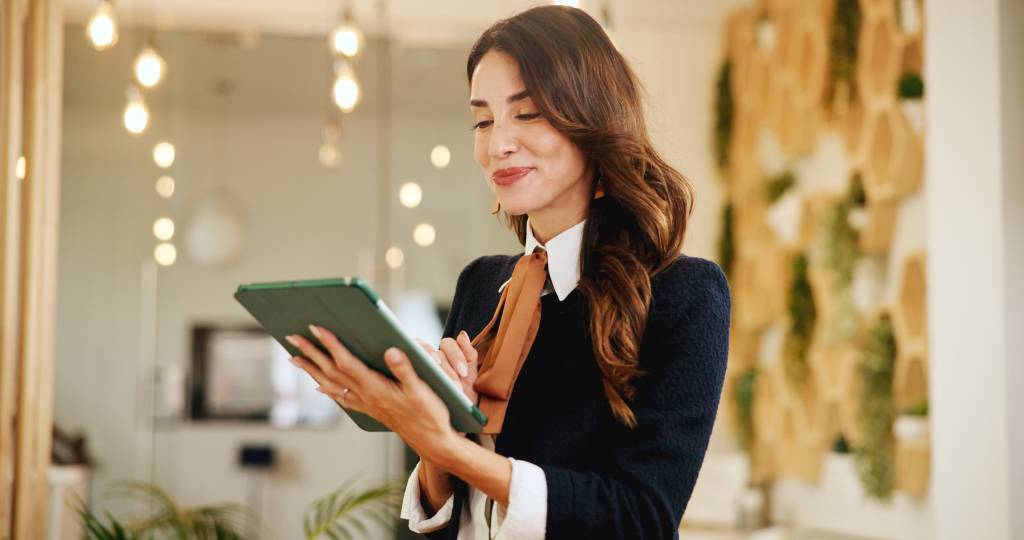 Hotel worker holding a tablet